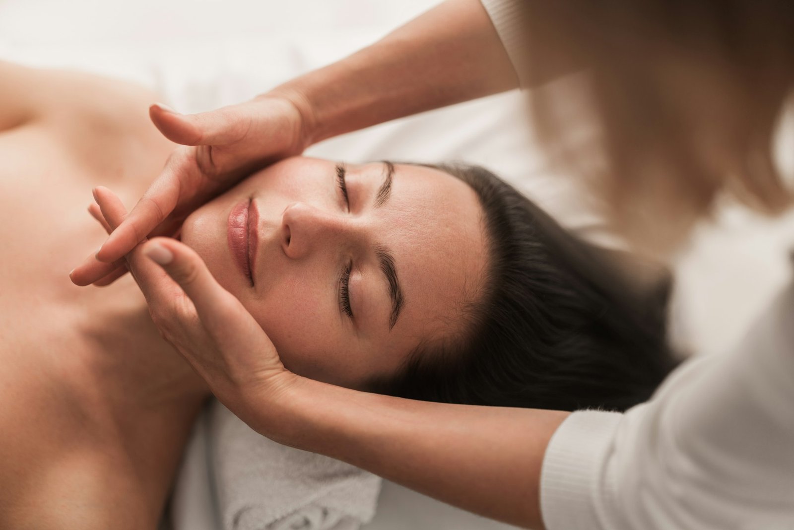 Masseuse doing massage to client